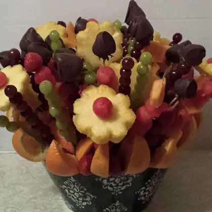 A fruit bouquet with pineapple daisies