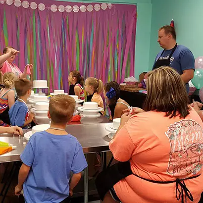 A birthday party with streamers and balloons