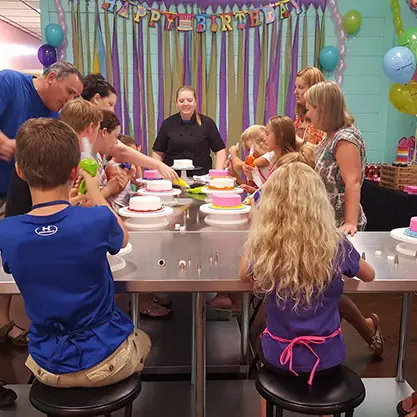 Guests around the decorating table