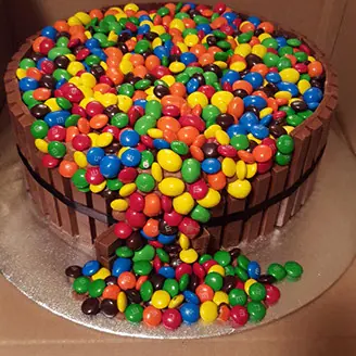 An M&M overflow cake