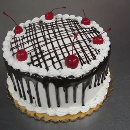 Cherry and chocolate drizzle cake