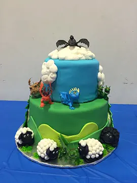 Blue and green tiers with a sheep